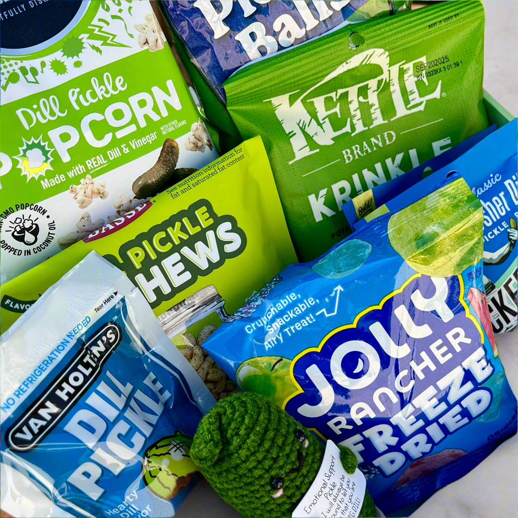 Assorted snack packages including Kettle Brand, Van Holtz, and Jolly Rancher on a white surface.